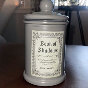 Book of shadows bloom and prosper candle